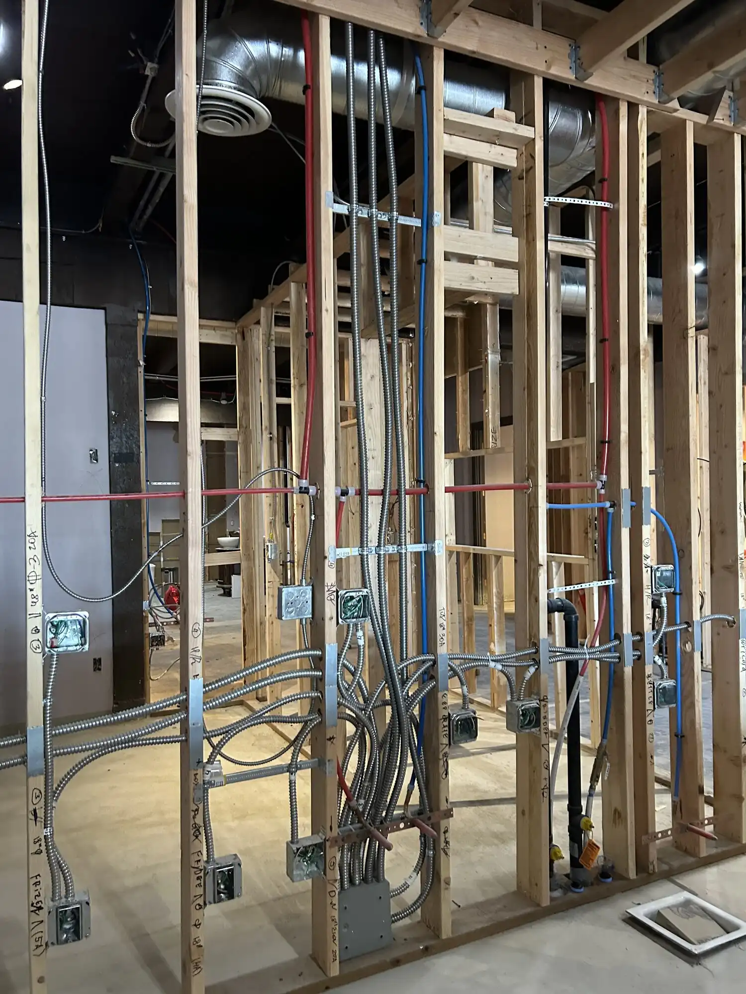 MC cable rough-in to labeled junction boxes in a Federal Way restaurant tenant improvement