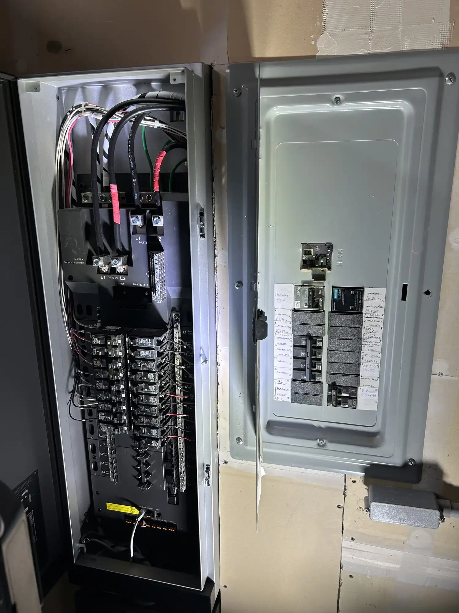 Inside view of EcoFlow Smart Home Panel 2 wiring beside the main panel during battery backup install in Puyallup, WA